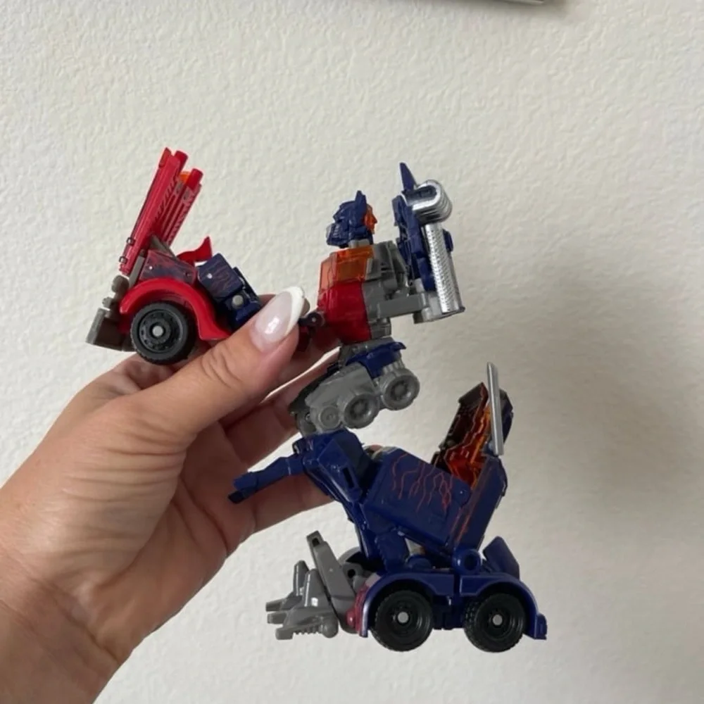 Hasbro Transforming Robot - Red, Blue, and Silver